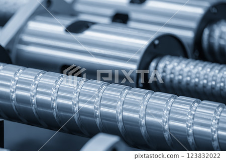 Closeup scene the spare parts lead ball screw set in the light blue scene. Closeup scene the spare parts lead ball screw set in the light blue scene. 123832022