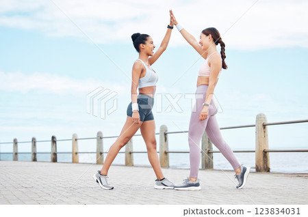 High five, fitness and women training in the city with support for body goal, health and wellness. Young, happy and excited runner friends with motivation for exercise, running and outdoor workout High five, fitness and women training in the city with support for body goal, health and wellness. Young, happy and excited runner friends with motivation for exercise, running and outdoor workout 123834031