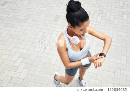 Exercise, runner and black woman with digital smartwatch to track steps, calories counter or heart rate. Sports health, running monitor and fitness app to check wellness, training and workout support Exercise, runner and black woman with digital smartwatch to track steps, calories counter or heart rate. Sports health, running monitor and fitness app to check wellness, training and workout support 123834085