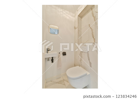 A sleek minimalist bathroom showcasing stylish tiles, a modern toilet design, and refined fixtures for an elegant appearance. A sleek minimalist bathroom showcasing stylish tiles, a modern toilet design, and refined fixtures for an elegant appearance. 123834246