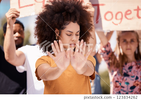 Protest, stop and hands of black woman with people in street for equality, freedom and human rights. Justice, community and group of activist on road in city for black lives matter and social change Protest, stop and hands of black woman with people in street for equality, freedom and human rights. Justice, community and group of activist on road in city for black lives matter and social change 123834262