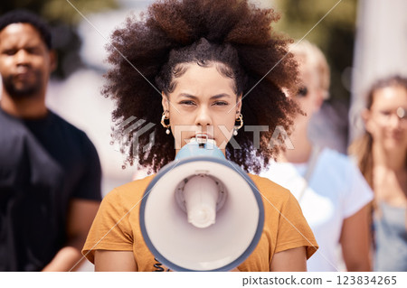 Freedom, revolution and megaphone with woman in protest event for community, support and leadership in rally. Global, social justice and human rights with gen z crowd for equality, future or politics 123834265