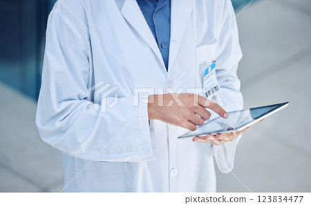 Doctor, digital tablet and healthcare with man using 5g network for research, information technology or online consultation for health insurance FAQ. Hands of male GP using app for medical records Doctor, digital tablet and healthcare with man using 5g network for research, information technology or online consultation for health insurance FAQ. Hands of male GP using app for medical records 123834477