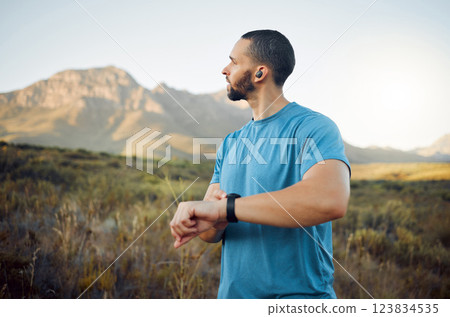 Exercise, thinking man and outdoor for view, workout or enjoy nature with digital watch for endurance. Wellness, fitness or healthy male in sportswear, peaceful outside for health or trainer stamina 123834535
