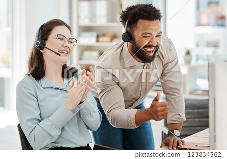 Crm, call center and thumb up with team celebration, wow and smile at work in office learning from manager. Man, woman and diversity in training for customer service, winner and goal in telemarketing Crm, call center and thumb up with team celebration, wow and smile at work in office learning from manager. Man, woman and diversity in training for customer service, winner and goal in telemarketing 123834562