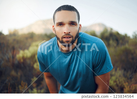 Exercise, forest and fitness portrait of man hiking, trekking and running in the woods for adventure, wellness and cardio. Nature sports workout, body health and runner on countryside training run 123834564