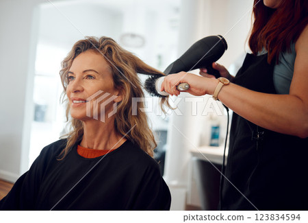 Hair care, hairdresser and senior woman client hair treatment, professional salon service and hairdryer. Small business, elderly female and brush modern hairstyle, happy customer and beautician lady. 123834594