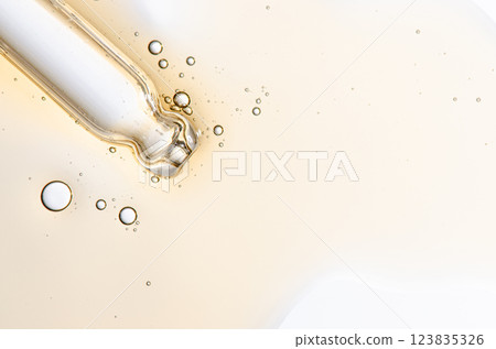Textured background of cosmetic moisturizing gel or skin serum. Copy space 123835326