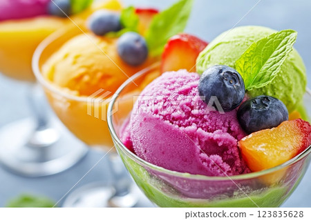 Refreshing fruit sorbets elegantly served in colorful dishes. 123835628