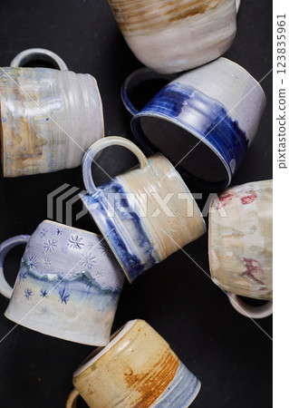 Ceramic cup on rustic background 123835961