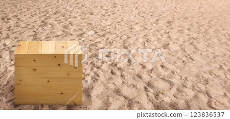Empty wooden box on the beach with sunlight. 123836537