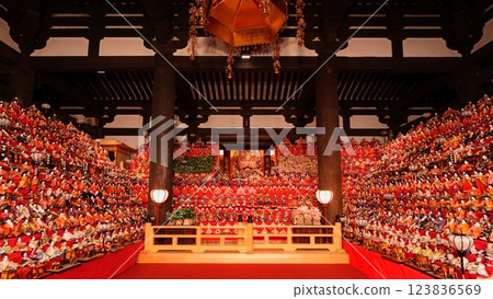The large Hina Mandala displayed in the worship hall of the Tsubosaka Temple in Nara Prefecture and the Eleven-Headed Thousand-Armed Kannon Bodhisattva statue visible in the background [March] 123836569