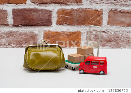 Image of money and parcel shipping Image of money and parcel shipping 123836733