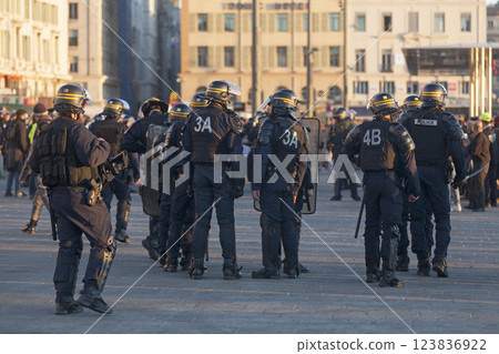 CRS and police officers in riot gear at the Vieux Port of Marseille 123836922