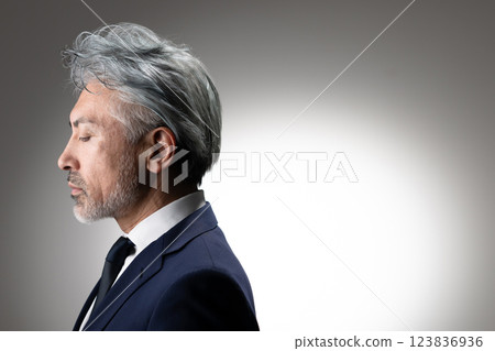 A man in a suit A man in a suit 123836936