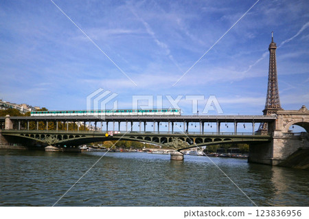 Subway train passing on the viaduc de Passy near the Eiffel Tower in Paris Subway train passing on the viaduc de Passy near the Eiffel Tower in Paris 123836956