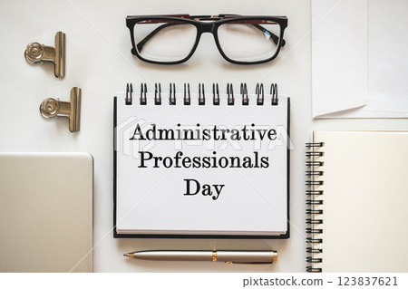 Happy Administrative Professionals Day. Notepad with congratulatory inscriptions Happy Administrative Professionals Day. Notepad with congratulatory inscriptions 123837621