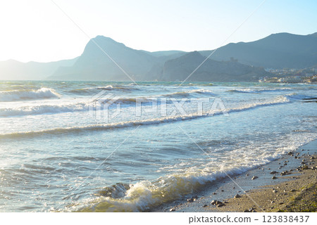 Background landscape view of Sudak Bay, the city of Sudak and its embankment in Crimea Background landscape view of Sudak Bay, the city of Sudak and its embankment in Crimea 123838437
