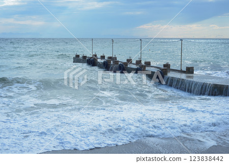 Background landscape view of Sudak Bay, the city of Sudak and its embankment in Crimea 123838442