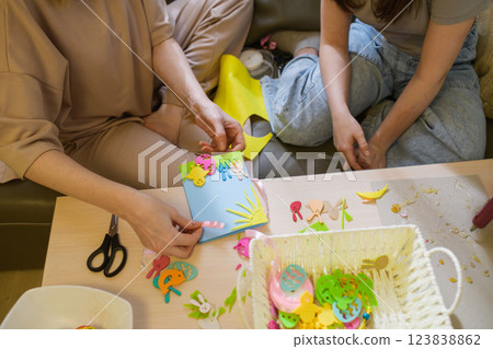 Handmade Easter greeting cards with felt decorations. 123838862