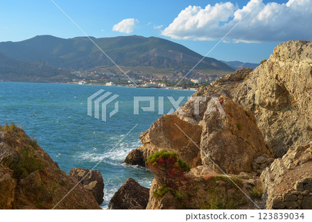 Background landscape view of Sudak Bay, the city of Sudak and its embankment in Crimea 123839034