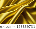 golden silk satin fabric texture background 123839731