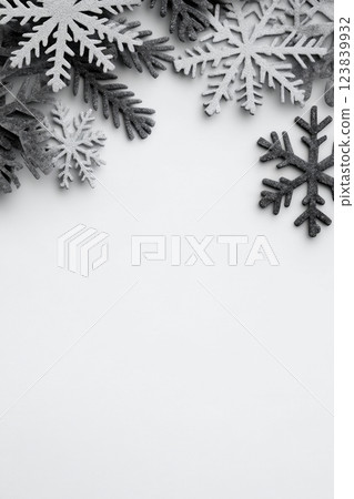 Winter decorations featuring snowflakes on a neutral background 123839932