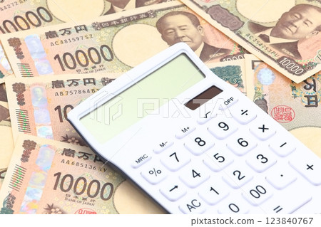 Image of money (calculator and banknotes) Image of money (calculator and banknotes) 123840767