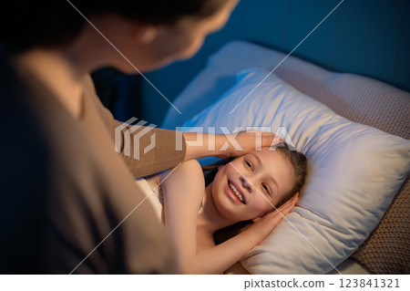 mom is waking up her daughter 123841321