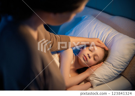 mom is waking up her daughter 123841324