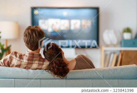Couple watching TV Couple watching TV 123841396