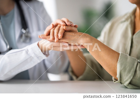 patient with a doctor in medical office patient with a doctor in medical office 123841650