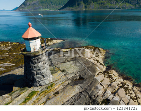 Gimsoy lighthouse on sea rocks, Lofoten Norway Gimsoy lighthouse on sea rocks, Lofoten Norway 123841722