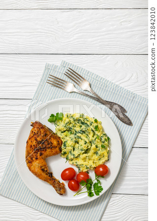 colcannon with kale with roasted chicken leg 123842010