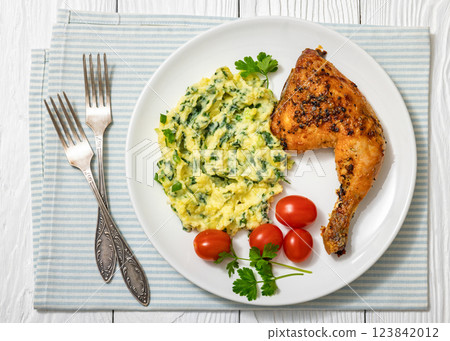 colcannon with kale with roasted chicken leg 123842012