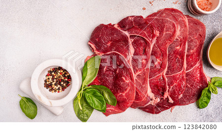 Raw organic steak with ingredients for cooking 123842080
