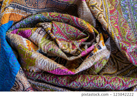 Handmade texture fabric for fashion clothes. Beautiful textile cotton scarf. Cloth background Handmade texture fabric for fashion clothes. Beautiful textile cotton scarf. Cloth background 123842222