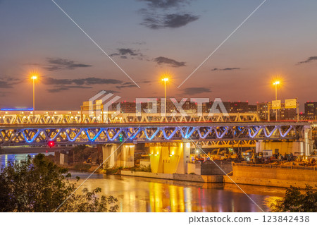 The scyscrapers of the Moscow City at night and the Dorogomilovsky bridge with illumination. Translation of text - street names: Krasnopresnenskaya, center, etc. The scyscrapers of the Moscow City at night and the Dorogomilovsky bridge with illumination. Translation of text - street names: Krasnopresnenskaya, center, etc. 123842438