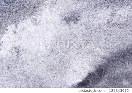 Abstract textured surface with gray and white patterns in natural lighting 123843015