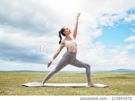 Yoga, stretching or zen woman in garden, nature environment or sustainability landscape in relax fitness or workout training. Calm, peace or pilates yogi in park, chakra balance or wellness exercise 123843078