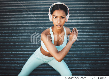 Fitness portrait of black woman with music headphones for exercise, sports training or body workout motivation. Cardio running, wellness health or runner girl listening to radio song or audio podcast Fitness portrait of black woman with music headphones for exercise, sports training or body workout motivation. Cardio running, wellness health or runner girl listening to radio song or audio podcast 123843084