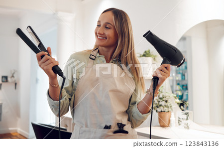 Woman, hairdresser and smile with hair tools for success in remote small business in salon. Happy female freelancer or professional hairstylist in shop smiling for career, dream and ambition at work Woman, hairdresser and smile with hair tools for success in remote small business in salon. Happy female freelancer or professional hairstylist in shop smiling for career, dream and ambition at work 123843136