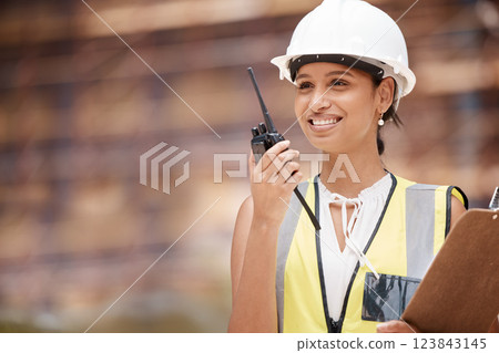 Construction site, contractor and woman talking radio communication, industrial building project management and architecture planning. Happy female engineering, development manager or city technician 123843145