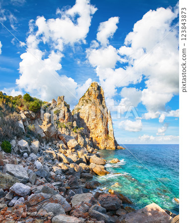 Remarkable view of Punta Pedra Longa and azure water in sea. 123843873