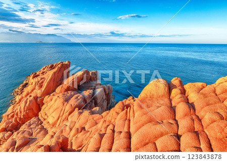 Exciting sunset view of Red Rocks (Rocce Rosse) in Arbatax. Exciting sunset view of Red Rocks (Rocce Rosse) in Arbatax. 123843878