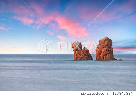 Remarkable sunset view of Red Rocks (is Scoglius Arrubius) on Cea beach 123843884