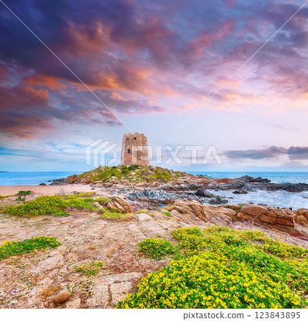 Exciting  sunset view of Bari Sardo tower in the Gulf of Orosei. 123843895