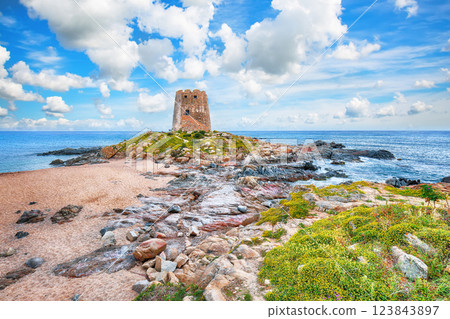 Impressive view of Bari Sardo tower in the Gulf of Orosei. Impressive view of Bari Sardo tower in the Gulf of Orosei. 123843897