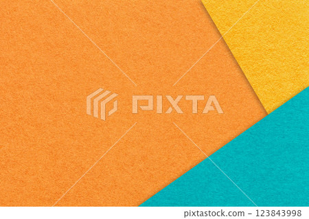 Texture craft orange paper background with yellow and turquoise border. Vintage abstract cerulean cardboard. 123843998