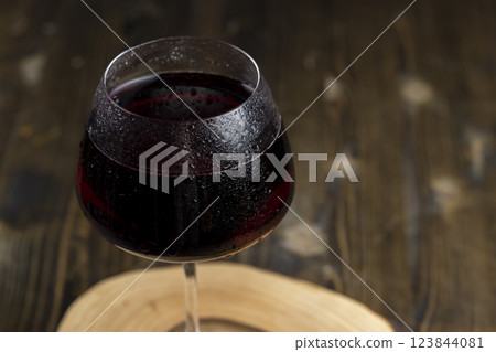 red drink in a glass glass 123844081